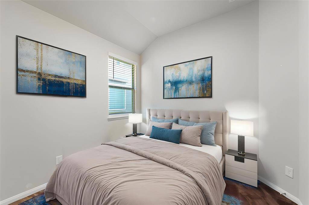 Virtually Staged: Secondary bedroom with carpet floors, and a window with privacy blinds.