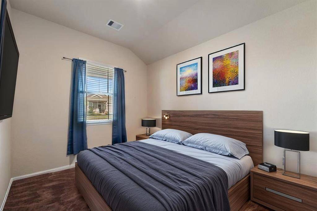 Virtually Staged: Secondary bedroom with carpet floors.