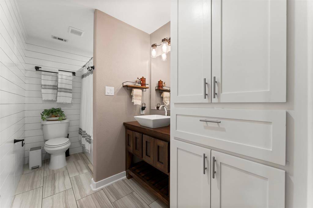 Charming wainscoting in this secondary bedroom.