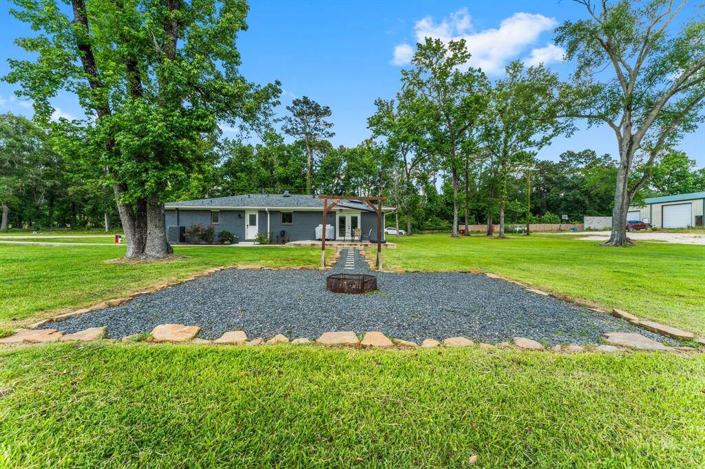 Raised back porch is the perfect size for grilling and dining al fresco.