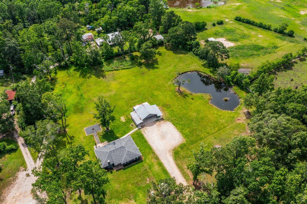 Truly a remarkable property! You'll enjoy lush greenery and a serene pond!