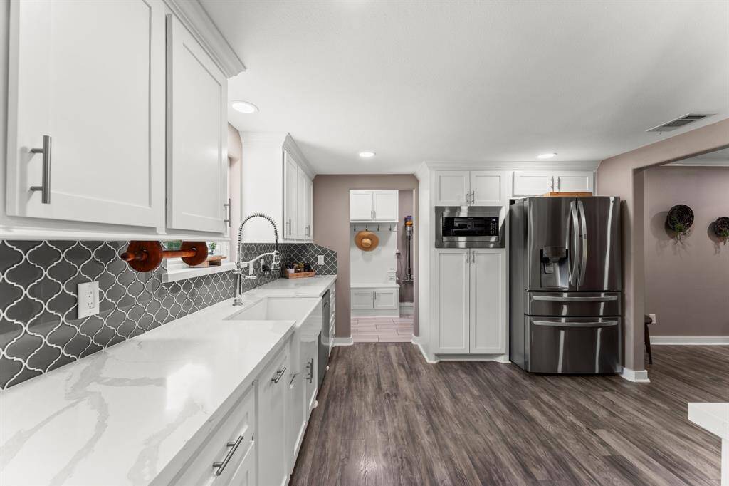 Charming dining room off the kitchen is great for hosting.
