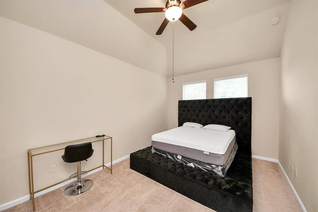 Second bedroom on the third floor with it's own bathroom.