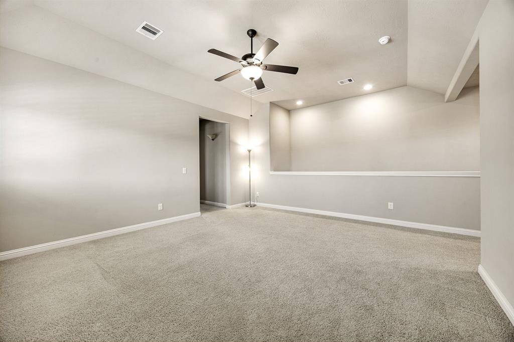 The upstairs game room offers a flexible space for fun and relaxation, perfect for movie nights, game days, or a play area. Plenty of room to customize and fit your lifestyle.