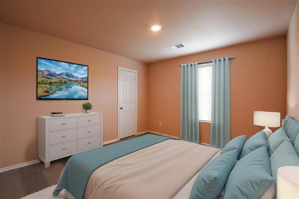 3rd bedroom, guest room or children's room is a great size.  This is a staged photograph to show the size of the bedroom and give you an idea of the layout