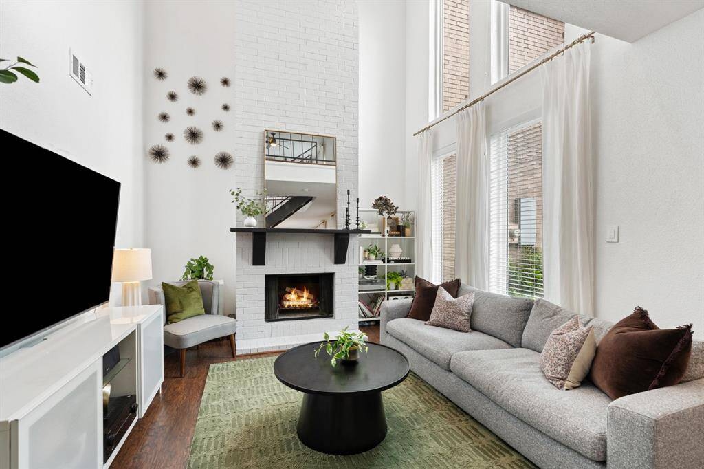 This spacious 2,082-square-foot corner townhome with a beautiful entryway welcomes you home!