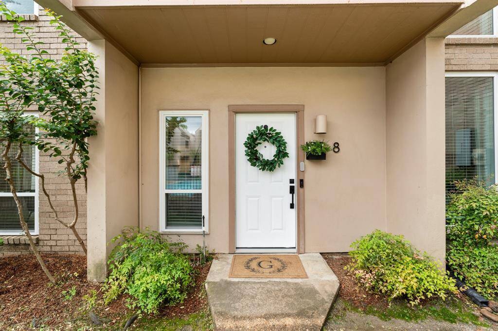 This bright room features large windows with a modern ceiling fan. Space could be a home office, playroom, exercise room, or den, or you could even add a few walls to make a 3rd bedroom!