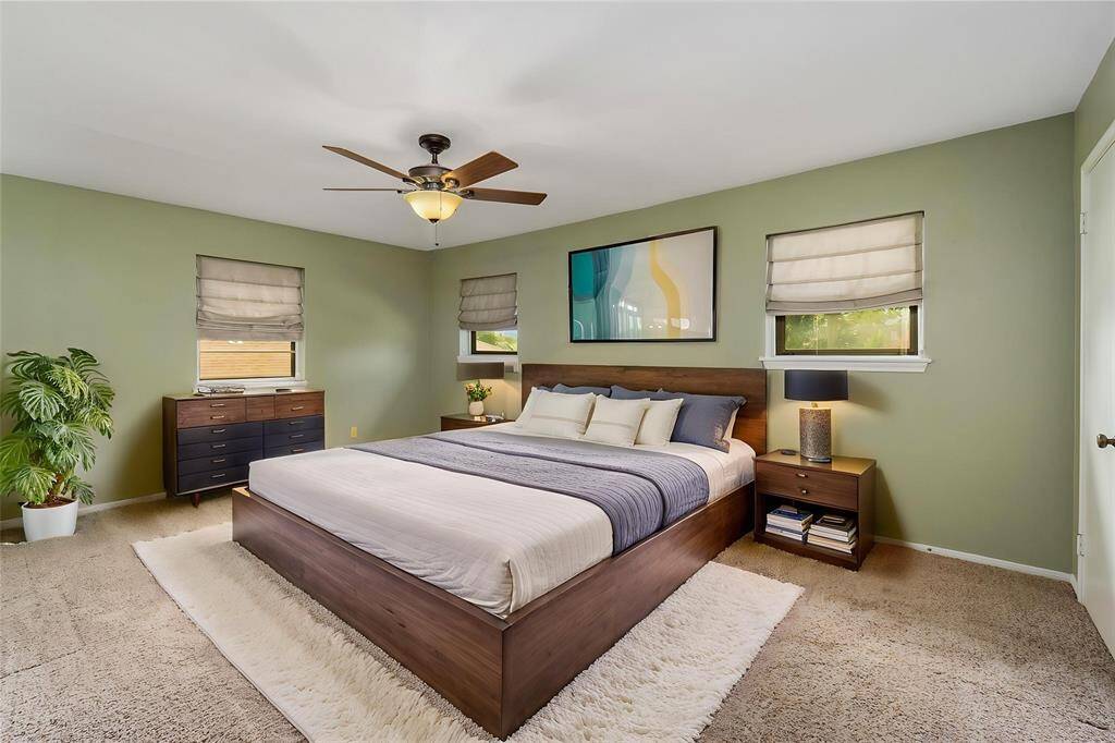 *Virtually Staged* - Bedroom 2. Upstairs has 2 closets and full bath.