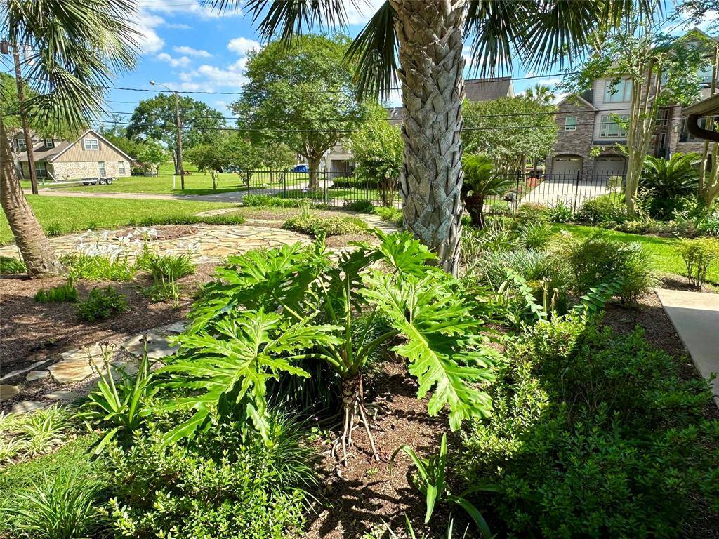 The programable sprinkler system keeps the garden beautiful and lush.