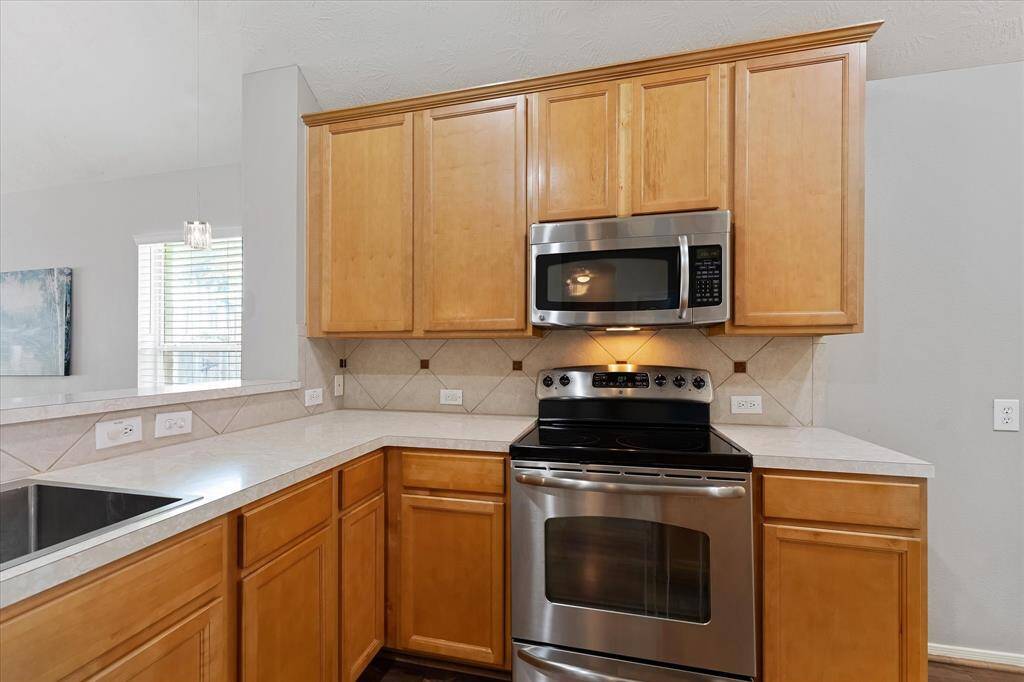 SS Appliances and lots of counter space.