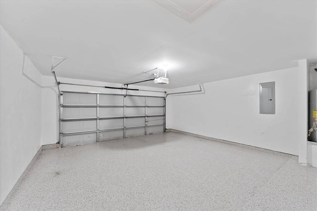 Epoxy coated flooring in the 2-car garage. Automatic garage door opener.