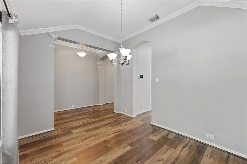 Updated paint color, flooring & light fixtures.