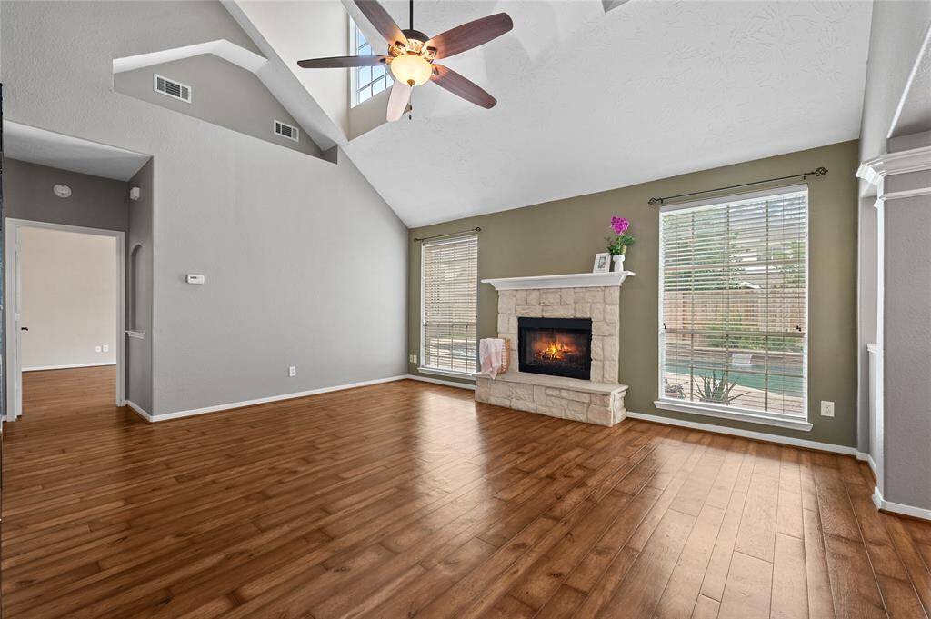 Family room with high ceilings, natural light and that openness feel.