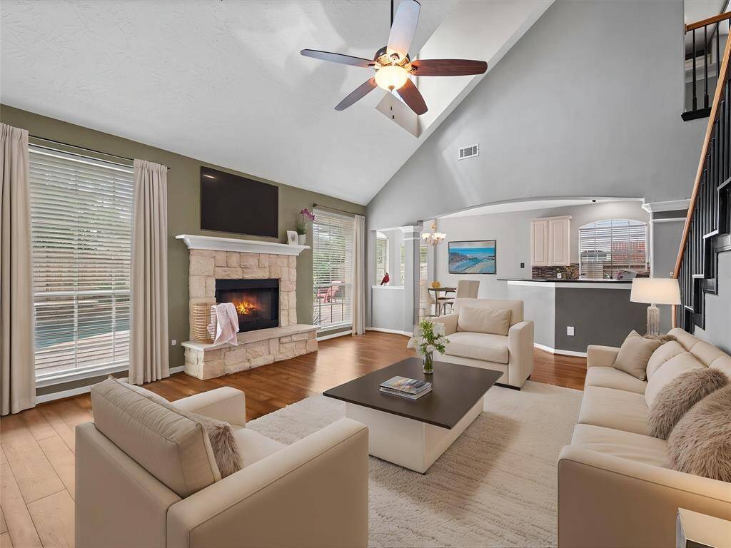 Gas log fireplace keeps you warm in the winter while the views of the pool will make you dream of summer.