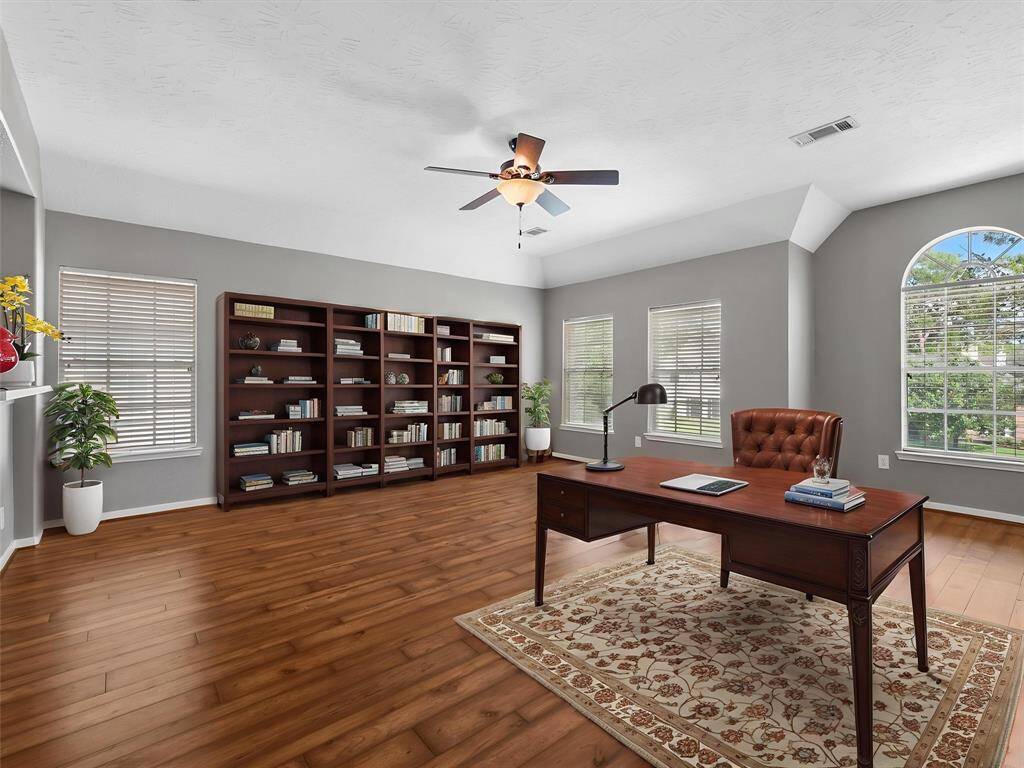 Landing area upstairs leading to 3 secondary bedrooms, 2 full bathrooms and a game room.