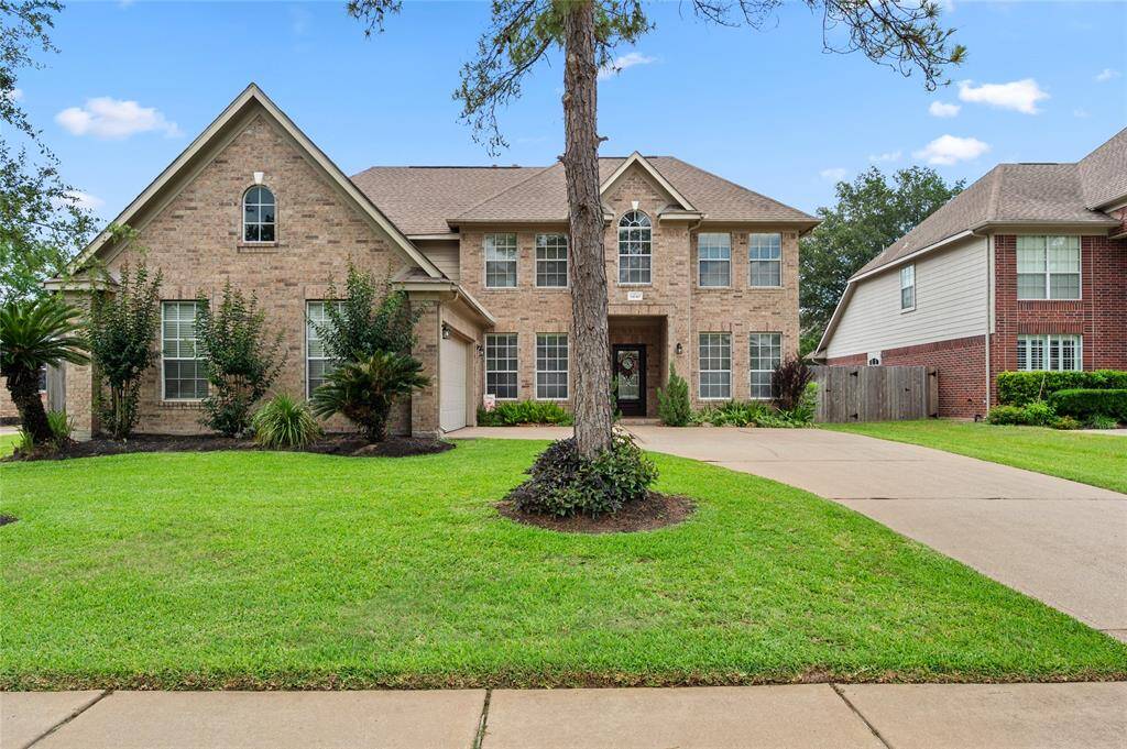 Lush landscaping frames the house perfectly!