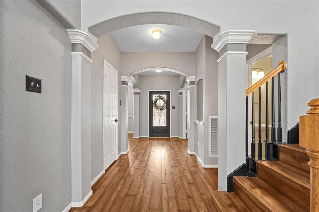 Front to back views from the entryway; Home office to the left; Formal dining room to the right