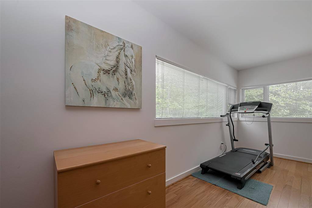 Enjoy scenic views while working out on the treadmill in this naturally lit corner.