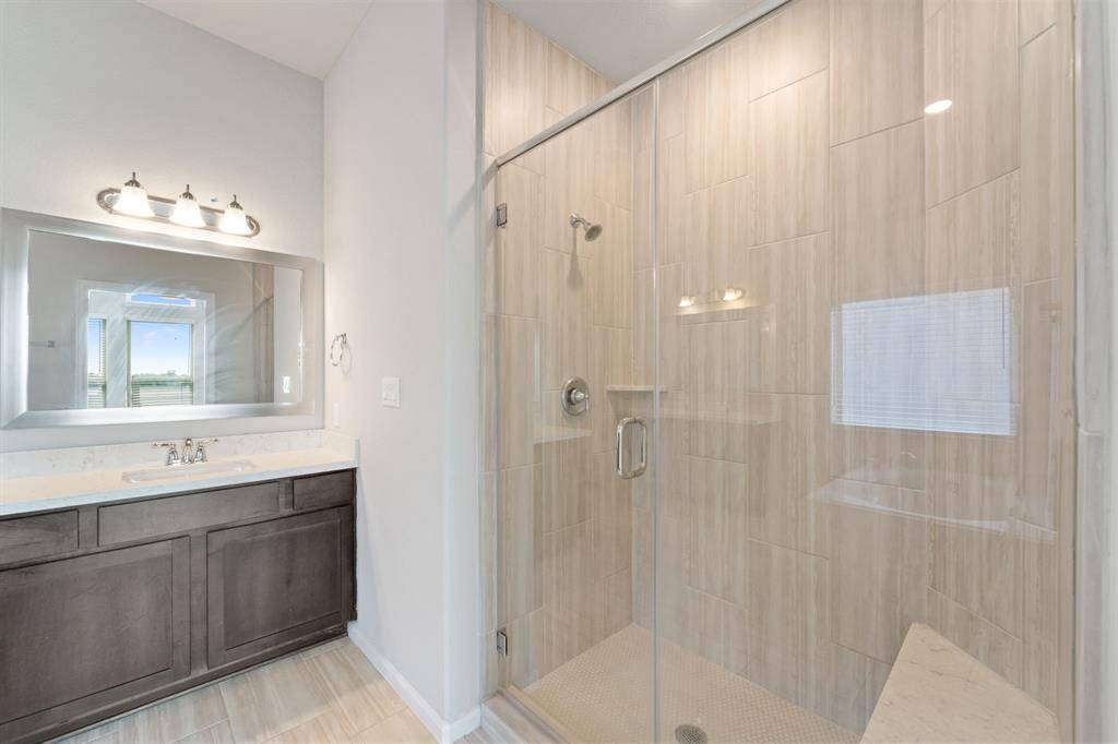 Large walk in shower with a separate soaking tub