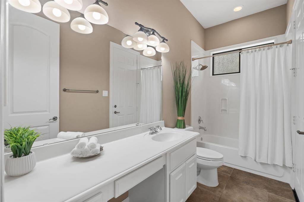 2nd Bathroom downstairs has direct access to the pool!