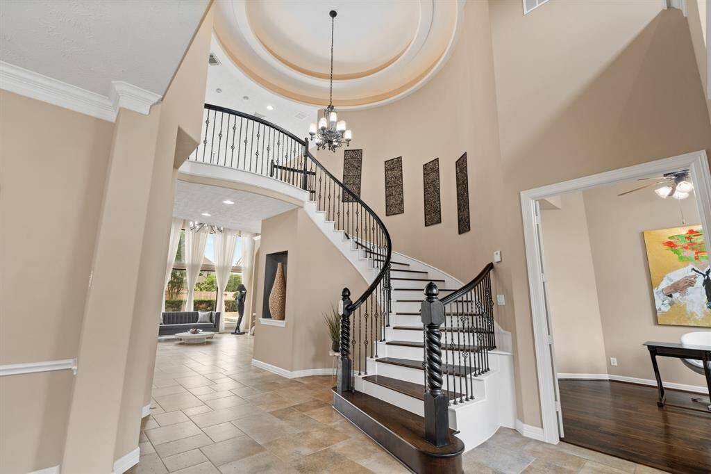 Beautiful elegance of the foyer with dramatic staircase