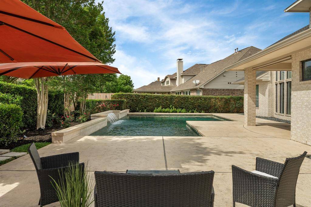 Beautiful pool with 10 ft depth for diving and a waterfall!