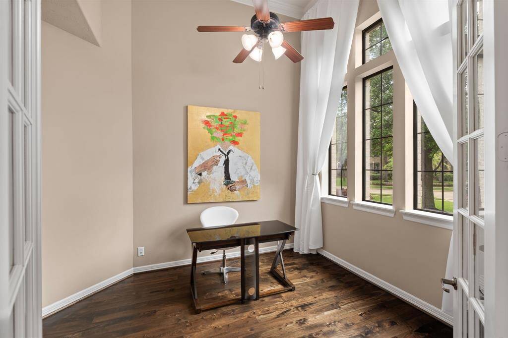 SEPARATE OFFICE room to the right of the entrance with French doors