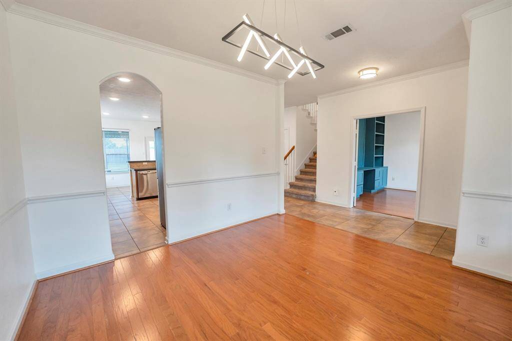 Effortlessly entertain with a seamless flow from the dining room to the kitchen.