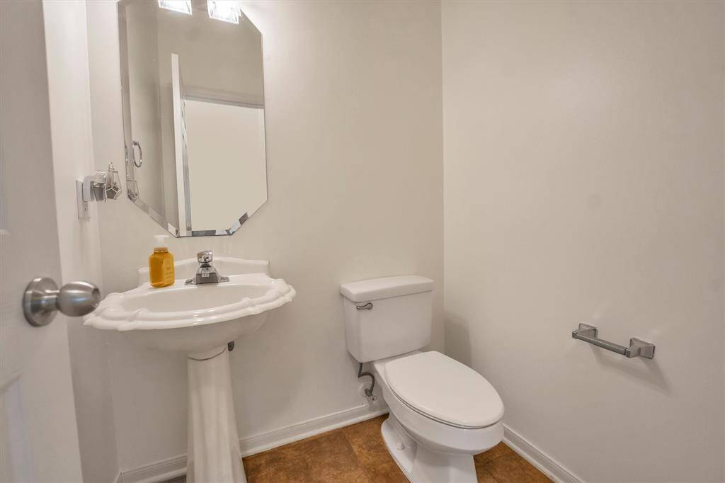 Convenient downstairs half bath for your guests.