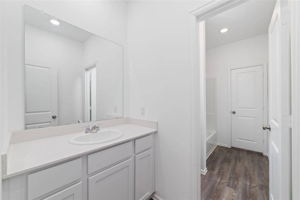 Side A of the jack and jill bath that leads to bedroom 3.