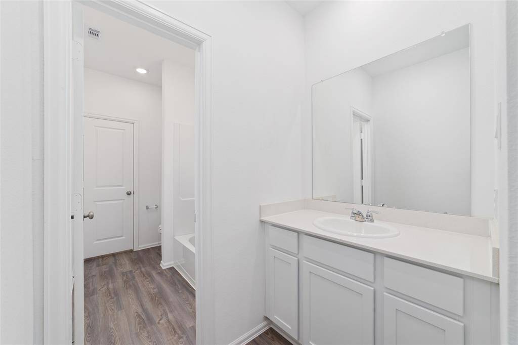 Side B of jack and jill bath before we check out out last secondary bedroom.
