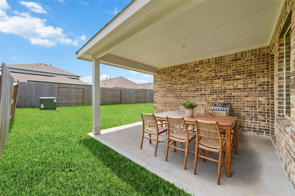 Large covered back patio for easy entertaining!
