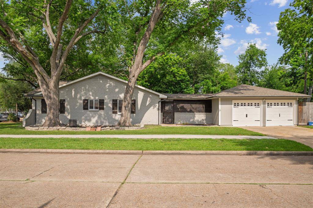 2 Car Garage and Mature Trees!