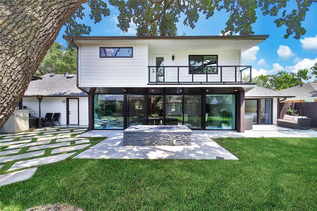 Enjoy the privacy this spacious backyard offers.