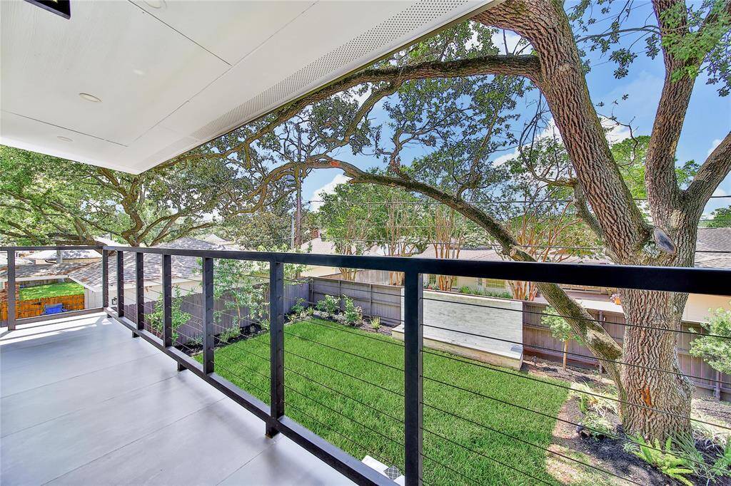 Beautiful upstairs primary bathroom with double sinks, soaking tub, glass shower with dual shower heads.