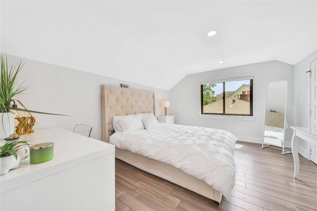 Upstairs secondary bedroom with two closets.
