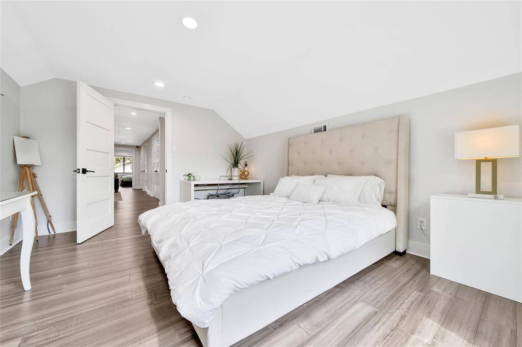 Upstairs secondary bedroom with two closets.