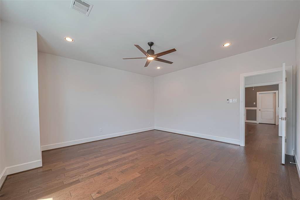 game room with a door leading to walk in attic