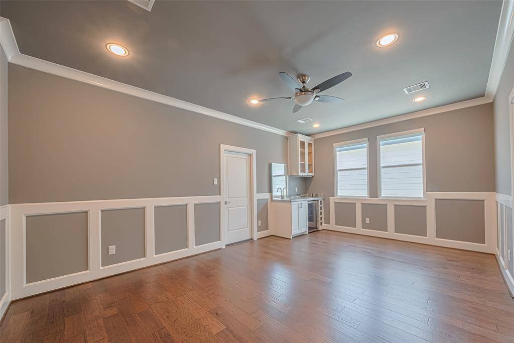 primary bedroom with entrance to balcony