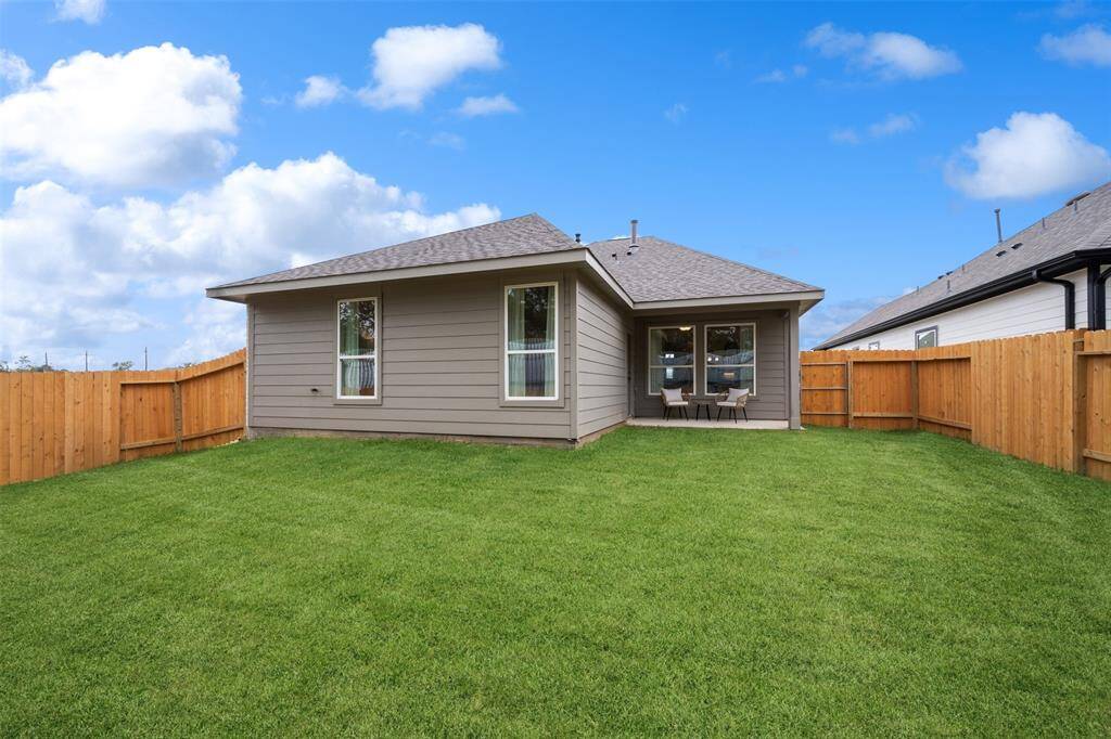 Enjoy outdoor living in this inviting backyard
