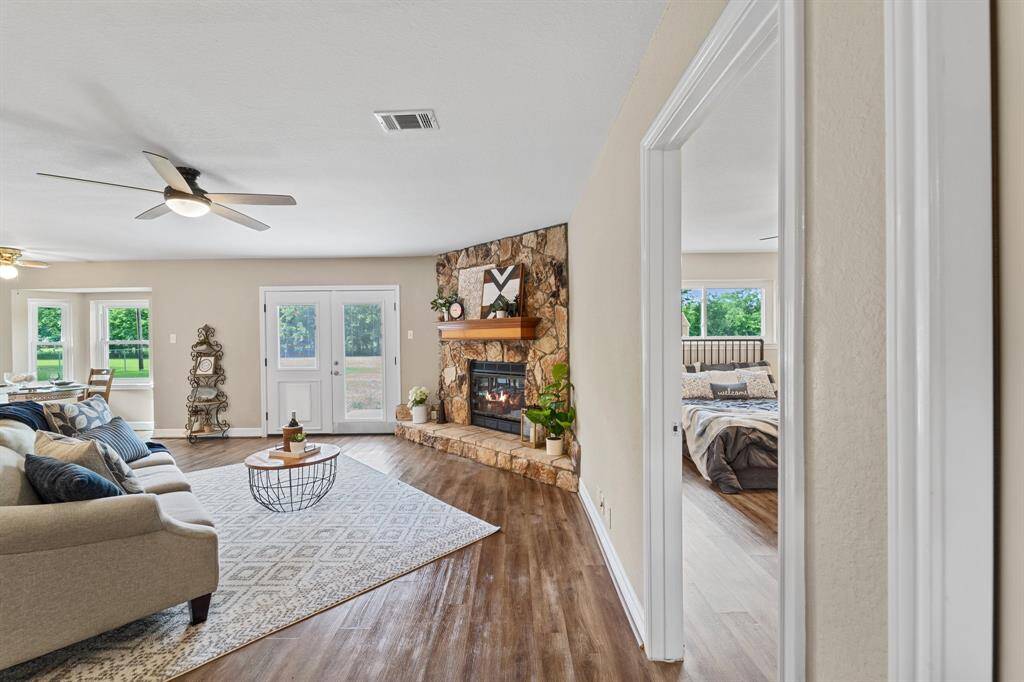 Dining nook with abundant natural light, seamlessly connected to a modern kitchen. Perfect for eating meals with a view.