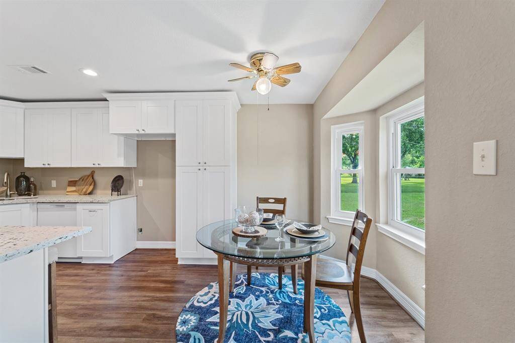 Spacious primary bedroom with direct access to the inviting living room.