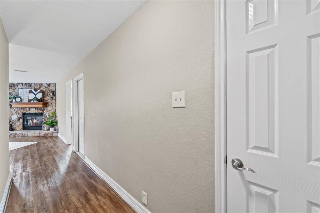 Elegant dining area seamlessly connected to a modern kitchen and cozy living space, perfect for entertaining and gatherings.