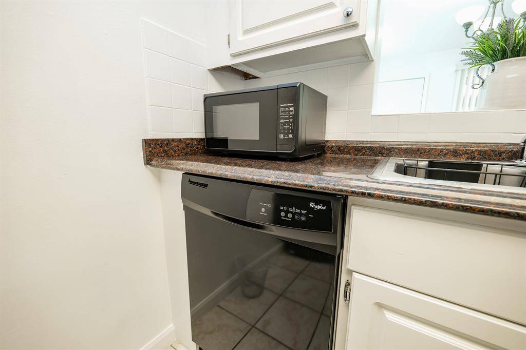 Black Whirlpool dishwasher included!