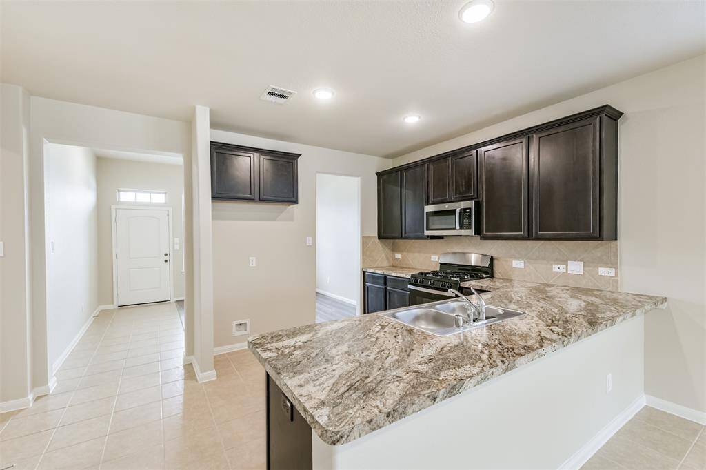 Nice Kitchen Breakfast Bar! Note the Fresh New Paint - Completed Only Days Ago!