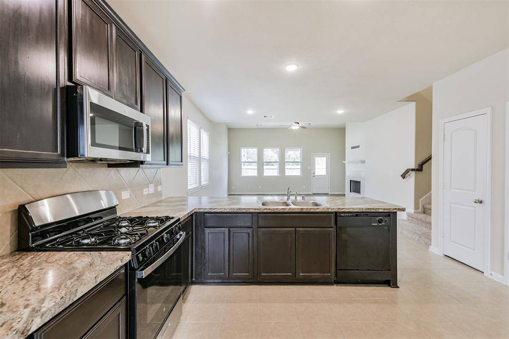 Kitchen Perspective from the Front Portion of the Home to the Rear!