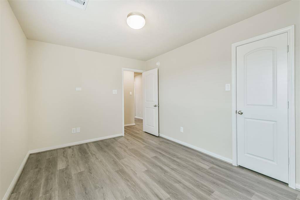 Additional Photo of Upstairs Bedrooms with New Flooring!