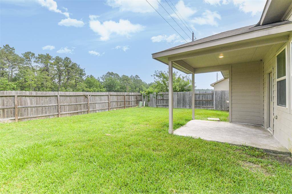 Large Backyard with Space for Outdoor Grilling or Children Playing! A Covered Patio is Perfect for Sitting Out on Misty Days!
