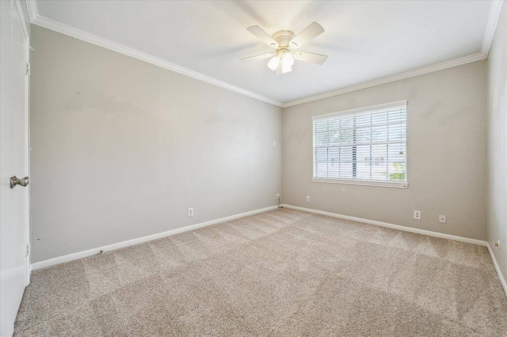 This additional upstairs bedroom mirrors the comfort and flexibility of the first, with neutral tones and a peaceful feel.