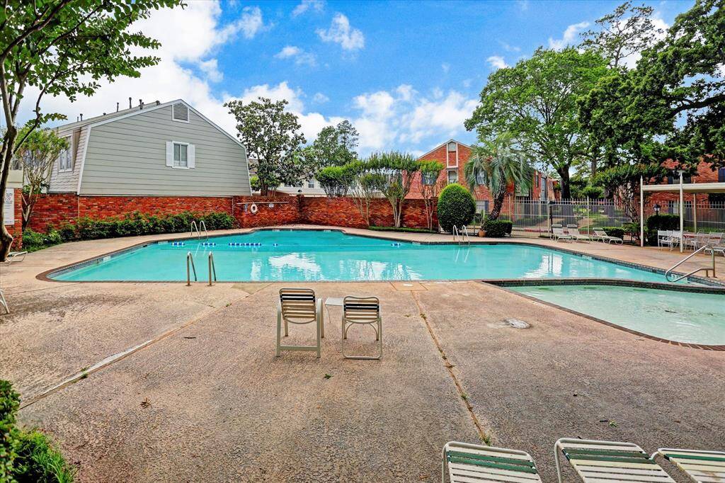 Take a refreshing dip or lounge poolside at the expansive community pool, complete with a separate shallow area ideal for relaxing.